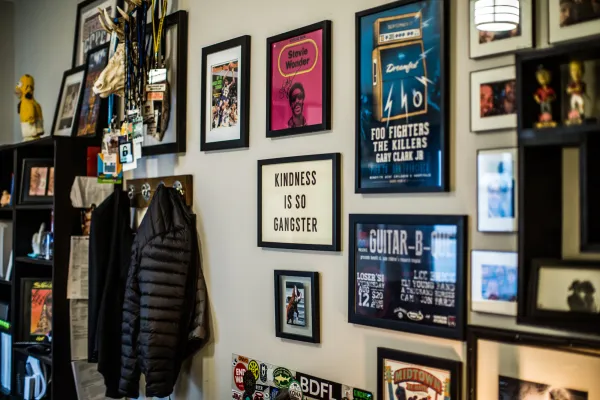 Image of personalized office decoration, framed items on a wall