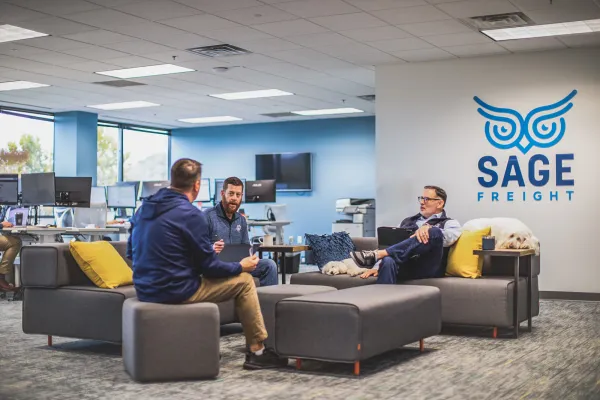 image of employees having a casual meeting